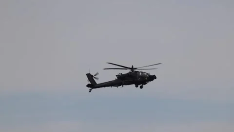 U.S. Army AH-64 Apache helicopter in flight Stock Footage 301062863