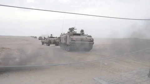 US Army armored vehicle training in desert in UAE Stock Footage 81514155