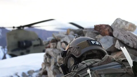 U.S. Army CH-47 Chinook transports Pararescuemen to mountains of Afghanistan Stock Footage 87318971