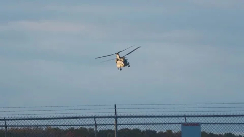 US Army Ch-47 Chinook Helicopter Liftoff, Turn, and Close Flyby, Selfridge ANGB Stock Footage 343793154
