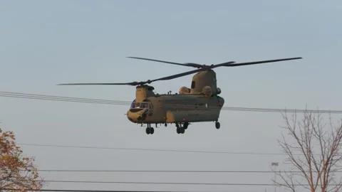 US Army CH-47 Chinook Helicopter Takeoff and Close-up Flyby Selfridge ANGB Stock Footage 343895740