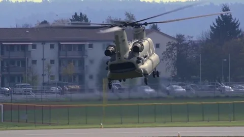 US Army Chinook traffic pattern training flight at Katterbach Airfield, Bavaria Video stock 81698119