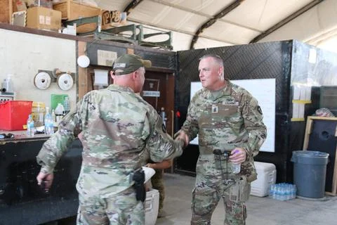 U.S. Army Command Sgt. Maj. Robert W. Hartzog (right) command sergeant maj... Photos