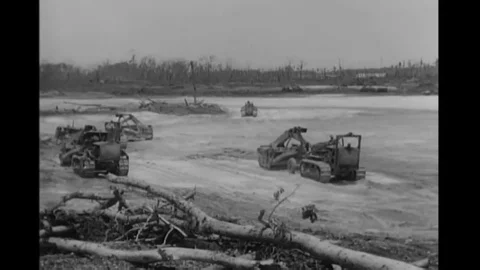 The U.S. Army Corps of Engineers builds an airfield, pumps water, lays pipe, Video stock 146474747