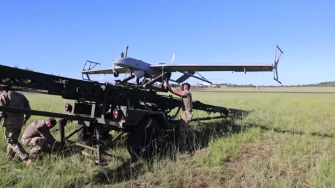 U.S. Army drone reversing on mobile launcher Stock Footage 255828365