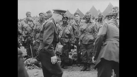 U.S. Army General Eisenhower visits troops at base and soldiers at war - 1945 Stock Footage 96020937