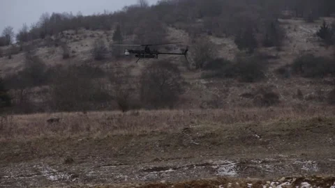 U.S. Army Ghost-X MR drone taking off, flying and landing at military camp Stock Footage 298226174