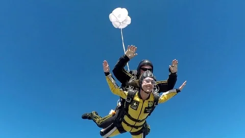 U.S. Army Golden Knights parachuting in tandem Stock Footage 106928547