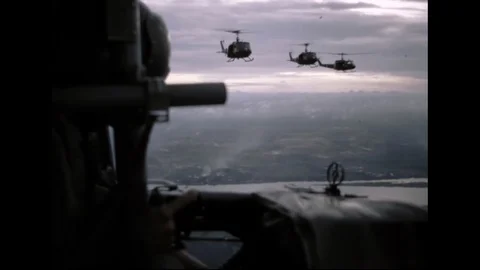 US Army Helicopters Flying In Formation Over Vietnam Stock Footage 97601874