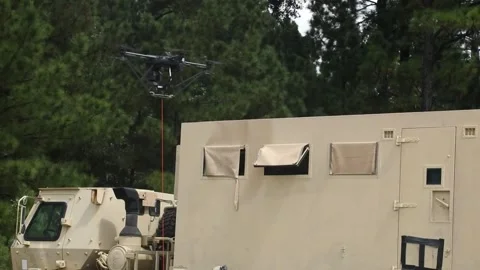 U.S. Army Hoverfly Tethered Drone landing Stock Footage 297066579