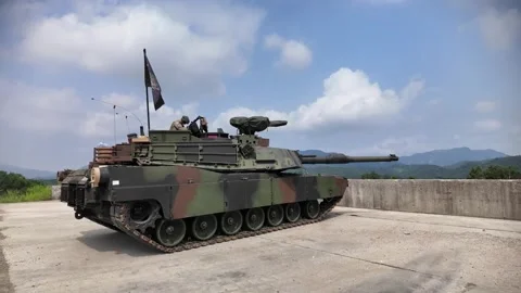 U.S. Army M1A2 Abrams battle tank firing main gun Stock Footage 281062702