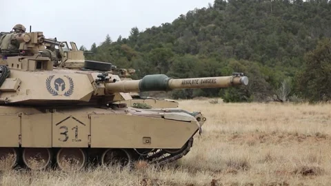 U.S. Army M1A2 Abrams battle tank rotates its turret during operations Stock Footage 334772912