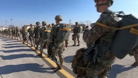 U.S. Army parachutists walking towards plane Video stock 103258441