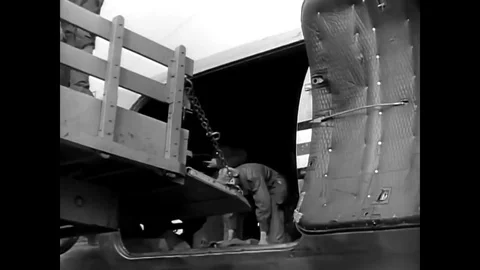 The U.S. Army Postal Service delivers the mail to troops in the field in the Stock Footage 83137598