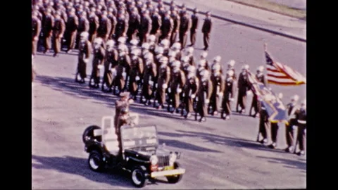 U.S. Army Procession with Jeep and American Flag in Post-WWII Germany - Archiva Stock Footage 332269283