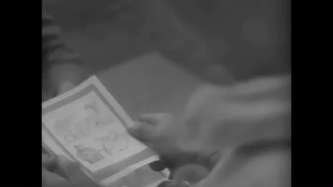 US Army propaganda is distributed in leaflet form through artillery shells, as Vídeo Stock 89660590