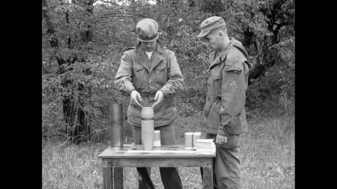 US Army Propaganda Warfare Techniques Preparing A Bomb Shell Stock Footage 94300214