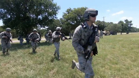 U.S. Army Security Forces soldiers running towards helicopter Stock-Footage 111811790