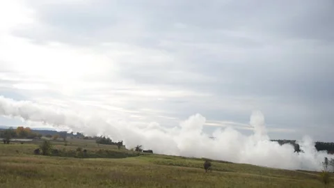 U.S. Army soldiers launch multiple rockets from M270 MLRS Stock Footage 255204099