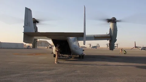 US Army Soldiers prepare to practice MV-22 external cargo lifts - 2015 Stock Footage 97520274