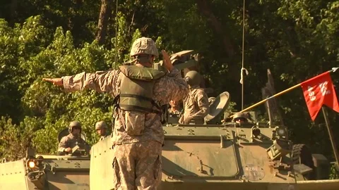 U.S. army troops practice a river assault operation. Video stock 123366604