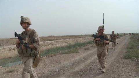 US Army troops walking through the steppes in Afghanistan Stock-Footage 85664237