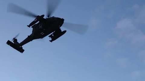 U.S. Army UH-60 Black Hawk Medevac helicopter flying overhead Video stock 299797624
