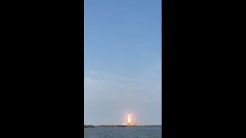 US: Artemis II rocket launch filmed from causeway near Titusville, Florid... Stock Footage 332186043