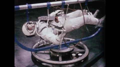 U.S. Astronaut Ed White Extravehicular Mobility Unit training Stock Footage 263418600