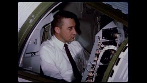 U.S. astronaut Virgil Ivan Gus Grissom checking out spacecraft controls Stock Footage 263292202