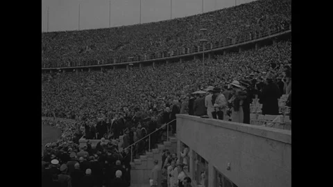 US athletes march through the Olympic village 動画素材 252537467