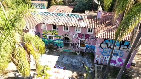 US: Bel Air Bin Laden Mansion Tagged with Grafitti Stock Footage 286189157