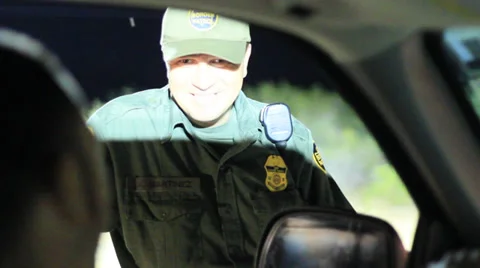 US Border Patrol Agent Interviews a Driver Stock Footage 39460243