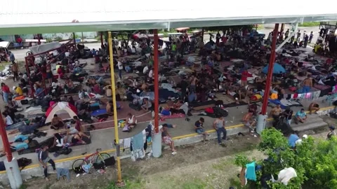 US-bound migrants set up camp in southern Mexico while weighing their options, M Stock Footage 204146173