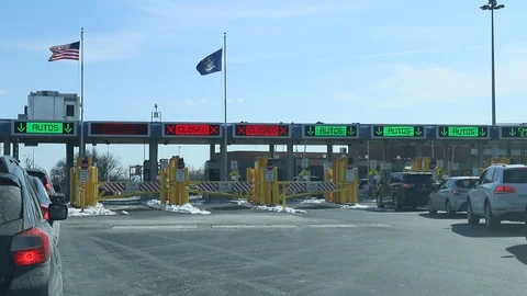 U.S.-Canada Border Flags Flying in Wind at American Border 库存影片 126762759