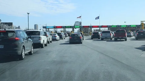 U.S.-Canada Border POV in Car Approaching U.S. Security Stock Footage 126762686