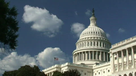 US Capitol Building with American Flag Stock Footage