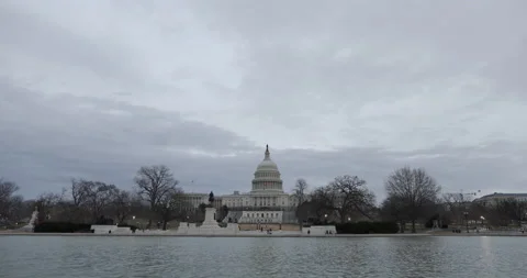 U.S. Capitol Building and Capitol Reflecting Pool - Washington, DC - Winter Stock Footage 170734700