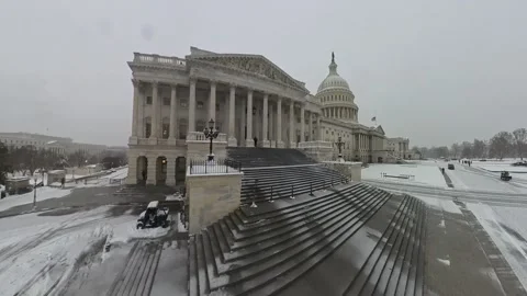 US Capitol Building during Snowfall Stock Footage 297119691