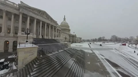US Capitol Building during Snowfall Video stock 297119724