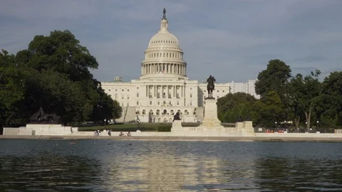 US Capitol Building with pond and ducks - 4k Stock Footage 110889794