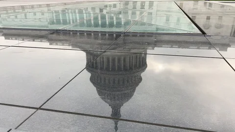 The US Capitol building reflection Stock Footage 128836943