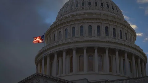 US Capitol Building Sunset Flag Glowing Stock Footage 71660114