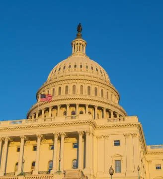 US Capitol building in warm light at sunset Stock Photos