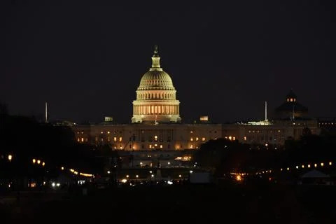 US Capitol building in Washington DC at night. Dark Background. Stock Photos