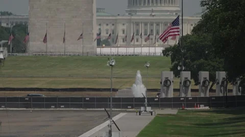 The US Capitol dome and Washington Monument beyond the drained Reflecting Pool Video stock 345283405