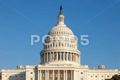U.s. capitol dome rear face on sunny winter day blue sky Stock Photos
