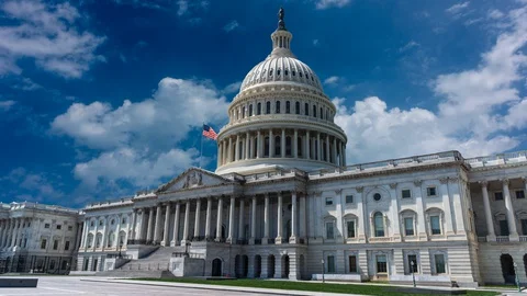 US Capitol time lapse cinemagraph with beautiful blue sky and clouds slowly Stock Footage 128527210