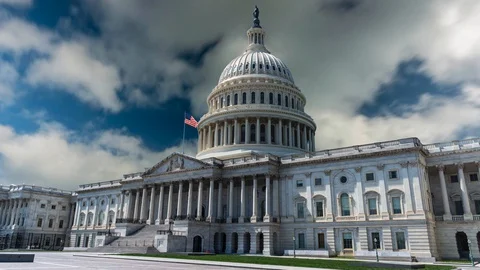 US Capitol time lapse cinemagraph with clouds rushing away from the camera. Video stock 128527582