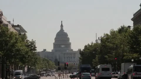 US Capitol with Traffic Stock Footage 8986176